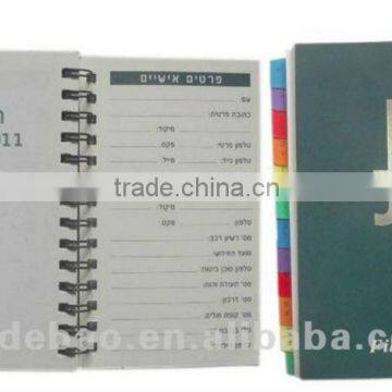 Hardcover spiral notebook with colored paper