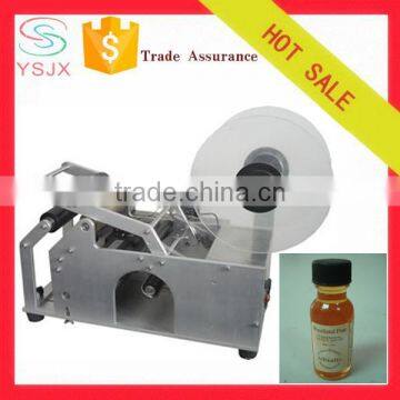 Low price 30ml e liquid bottle labeler manual labeling machine