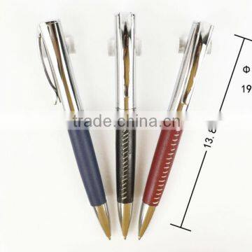 luxury metal twist action ballpen with leather barrel as corporate gift