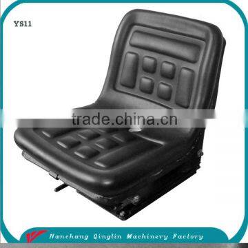 Tractor suspension backhoe seat with armrest