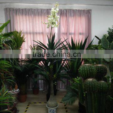 artificial green plant with flower for decoration