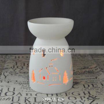 Hot sale porcelain white Christmas T-light oil burner with hollow design