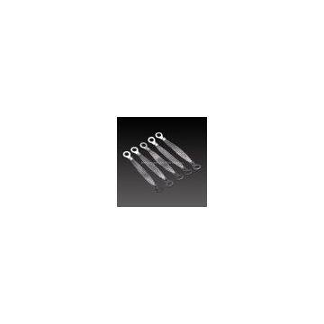 flexible connectors with solderless pressed terminals