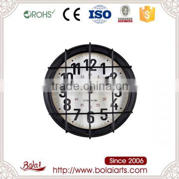 Alibaba hot selling round black mesh design hollow wooden wall clock