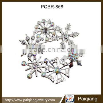 Latest design hot selling fashion silver cheap crystal winter snowflake brooch