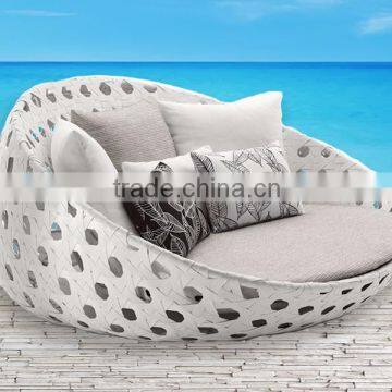 Round Sunbed in white wicker rattan for beach view