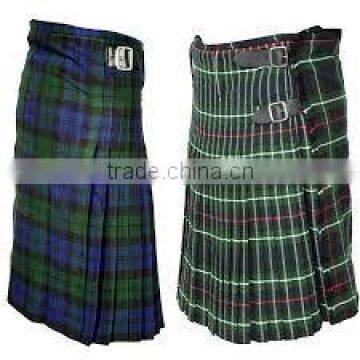 Traditional men and women Scottish kilts