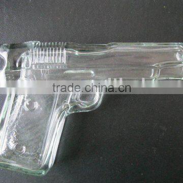 gun shaped glass bottle