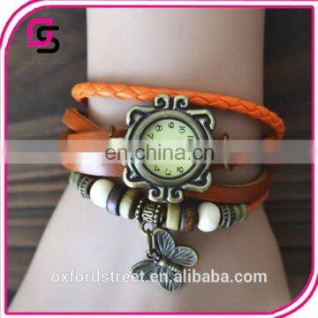 Ms Retro Hand-woven Imitation Leather Bracelet Watch Fashion and Colorful Butterfly Pendant Quartz Watch photo-4