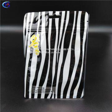 Chinese Manufacturer Produces Glossy Zipper PET/PE Bag for Medical Shoe Covers photo-4