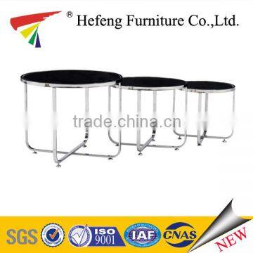 Chrome frame with glass top nesting table