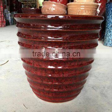 terracotta plant pots with red leopard glazed surface