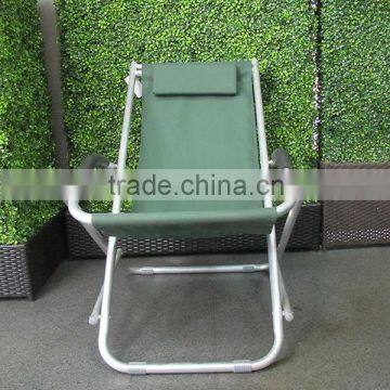 Green color outdoor chair, beach chair