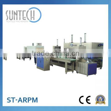 SUNTECH fabric roll heat sealing and packing machine