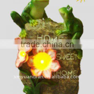 flower solar light on rock garden decoration