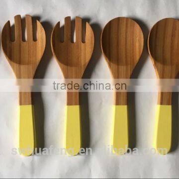 Bamboo spoon for salad and fork with color
