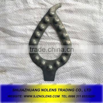 wrought iron,stamped brass ornaments,wrought iron rosettes