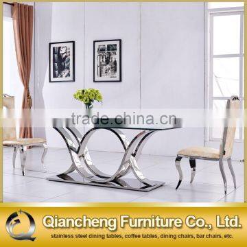 Fashion Tempered Glass Stainless Steel Dining Table and Chair Sets