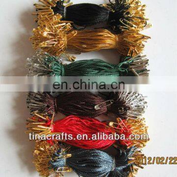 Garment hang tag string