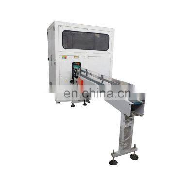 Automatic facial tissue paper log saw cutting machine