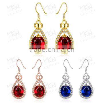 white gold plated ruby tack shape earring