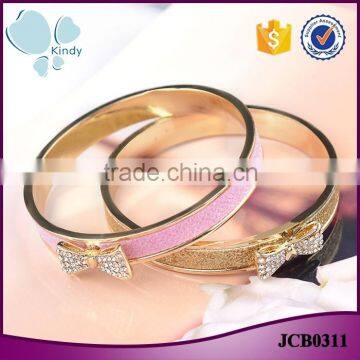 China wholesale gold plated jewelry zinc alloy rhinestone bowknot bangle for girls