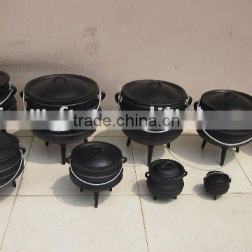 Cast iron black African three legged potjie pot