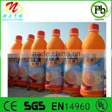 Inflatable advertising orange juice bottle