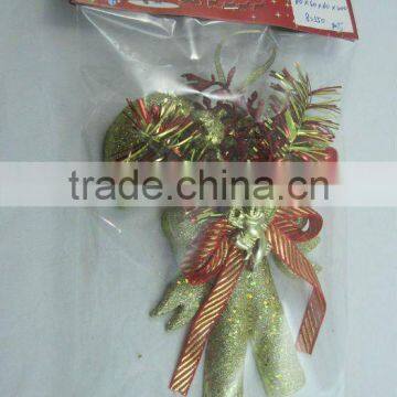 Plastic cane with angel on the ribbon