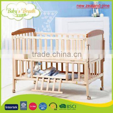 WBC-14A New Zealand Pine Wood Softextile New Born Baby Wooden Bed With Anti-skid Casters