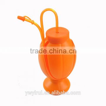 Rugby shape plastic cup with straw