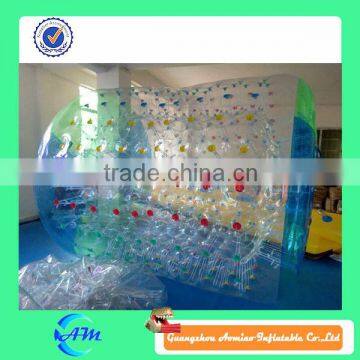 Colorful dots inflatable water roller inflatable roller balls for water in green and blue color for sale