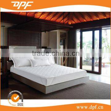 Hotel mattress protector with fitted sheet