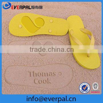 embossed sole flip flops