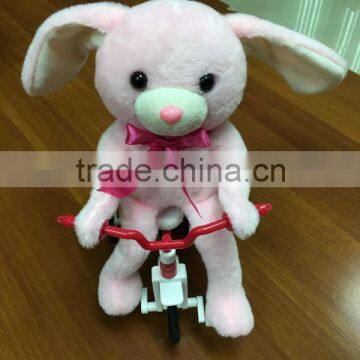 singing bunny in tricycle