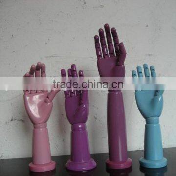 Long wrist wooden hand with round base