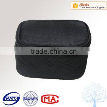 Black and round shape cosmetic bag with long zipper