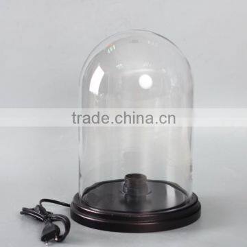 Glass bell cover with MDF base and wires