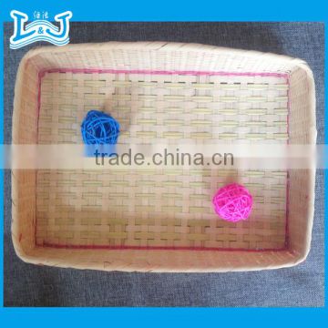 Chinese traditional handyman making bright color laundry basket rectangular large storage basket made by hand