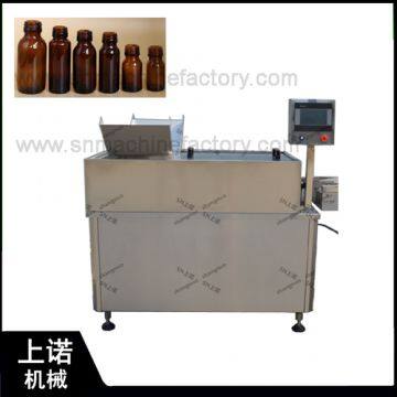 Liquid bottle washing machine for filling