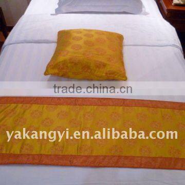 decorative cushion and bed runner