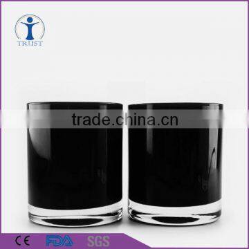 white and black glass candle jar with lid