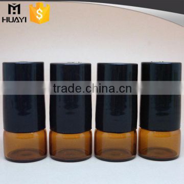 wholesale amber color 1ml glass roll on bottle with stainless steel roller ball