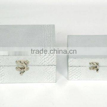 Silver alligator square jewelry box has buttons