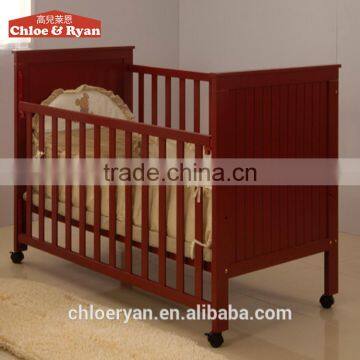 Multifunction wine red color wooden baby cot bed with drop side