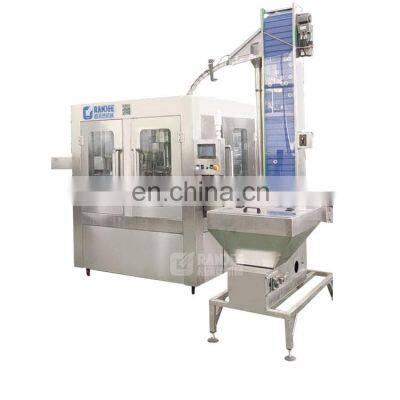 Automatic rotary peanut oil bottle filling and capping labeling machine