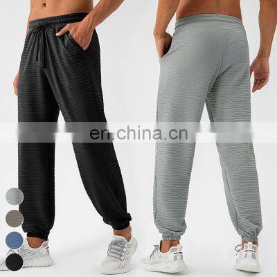 High Quality Breathable Quick Dry Cool Feeling Running Fitness Joggers Drawstring Bunched Casual Loose Trousers Men Jogger Pants