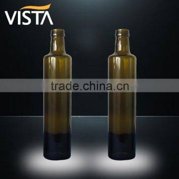 Round dark green olive oil glass bottle