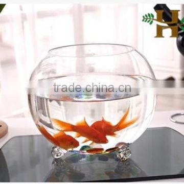 Handmade footed round shaped glass fish bowl