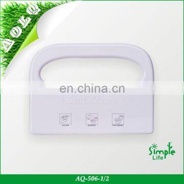 Plastic dispenser for disposable toilet paper seat cover